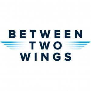 Cover art of Between Two Wings Between Two Wings